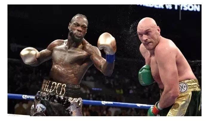 Pořádně se připrav, protože budeš bojovat o holý život! vzkazuje Wilder Furymu