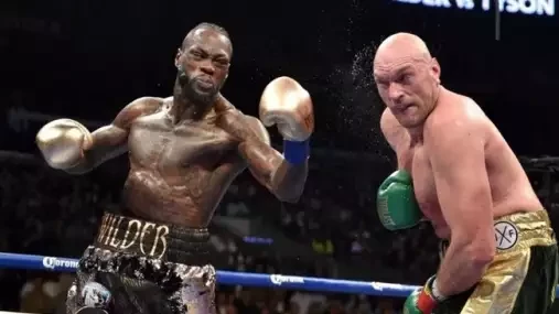 Pořádně se připrav, protože budeš bojovat o holý život! vzkazuje Wilder Furymu
