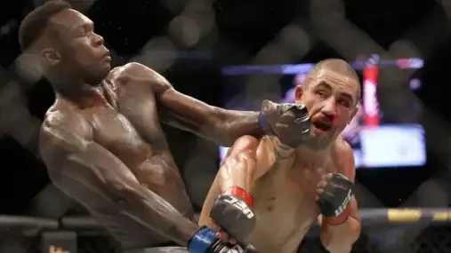 Whittaker by o titul neměl bojovat, naléhá Adesanyův trenér. Od Roba chce vidět větší aktivitu